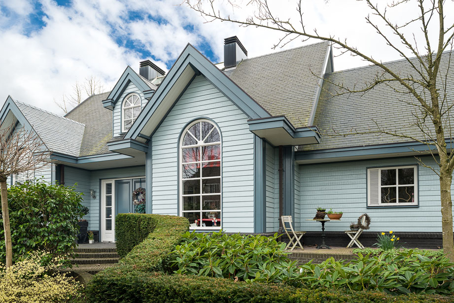 Woningfotografie van een houten huis in Amerikaanse stijl